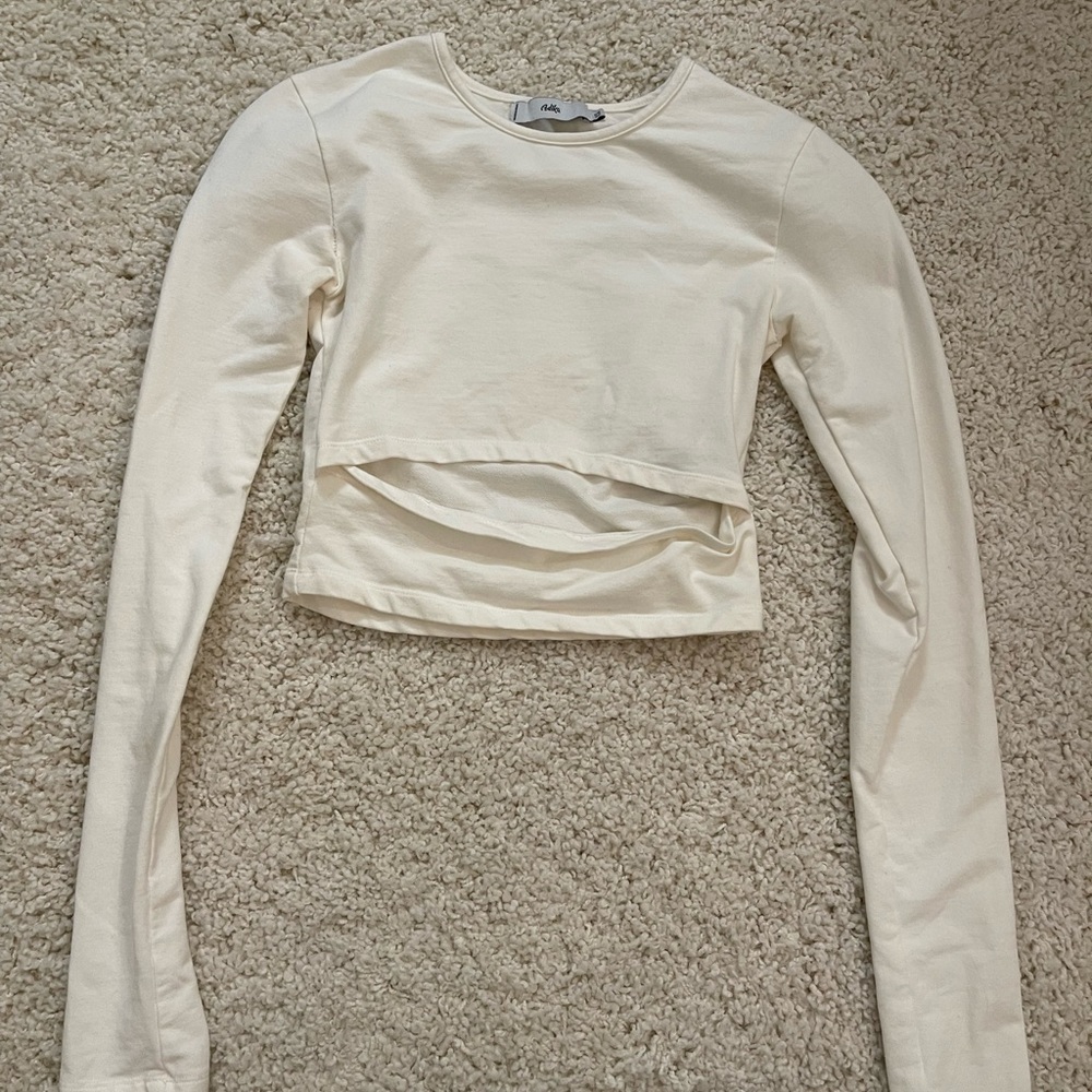 White long sleeve crop top with cut out